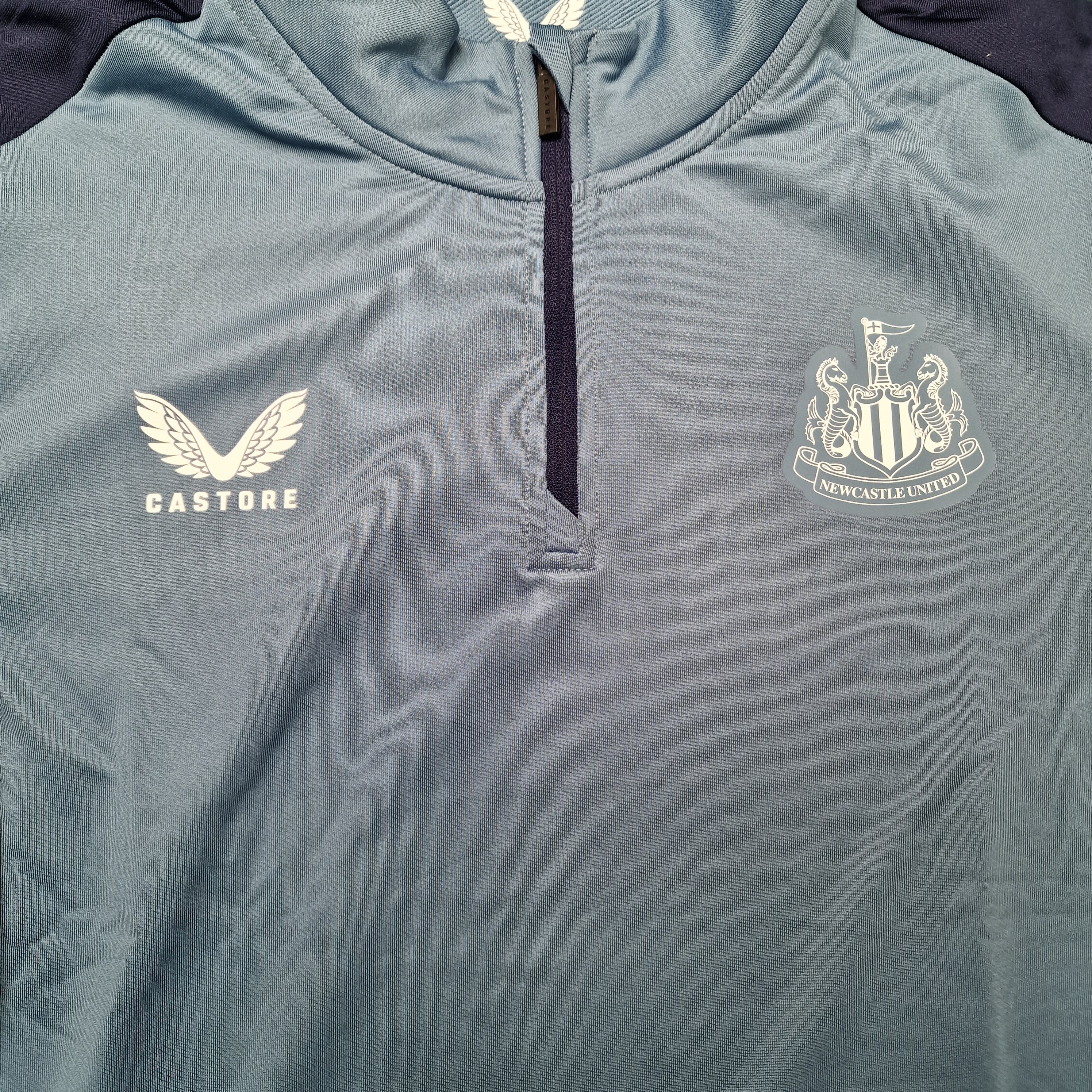 Newcastle United 2023/2024 Quarter Zip Training top (L) – Toon Kit