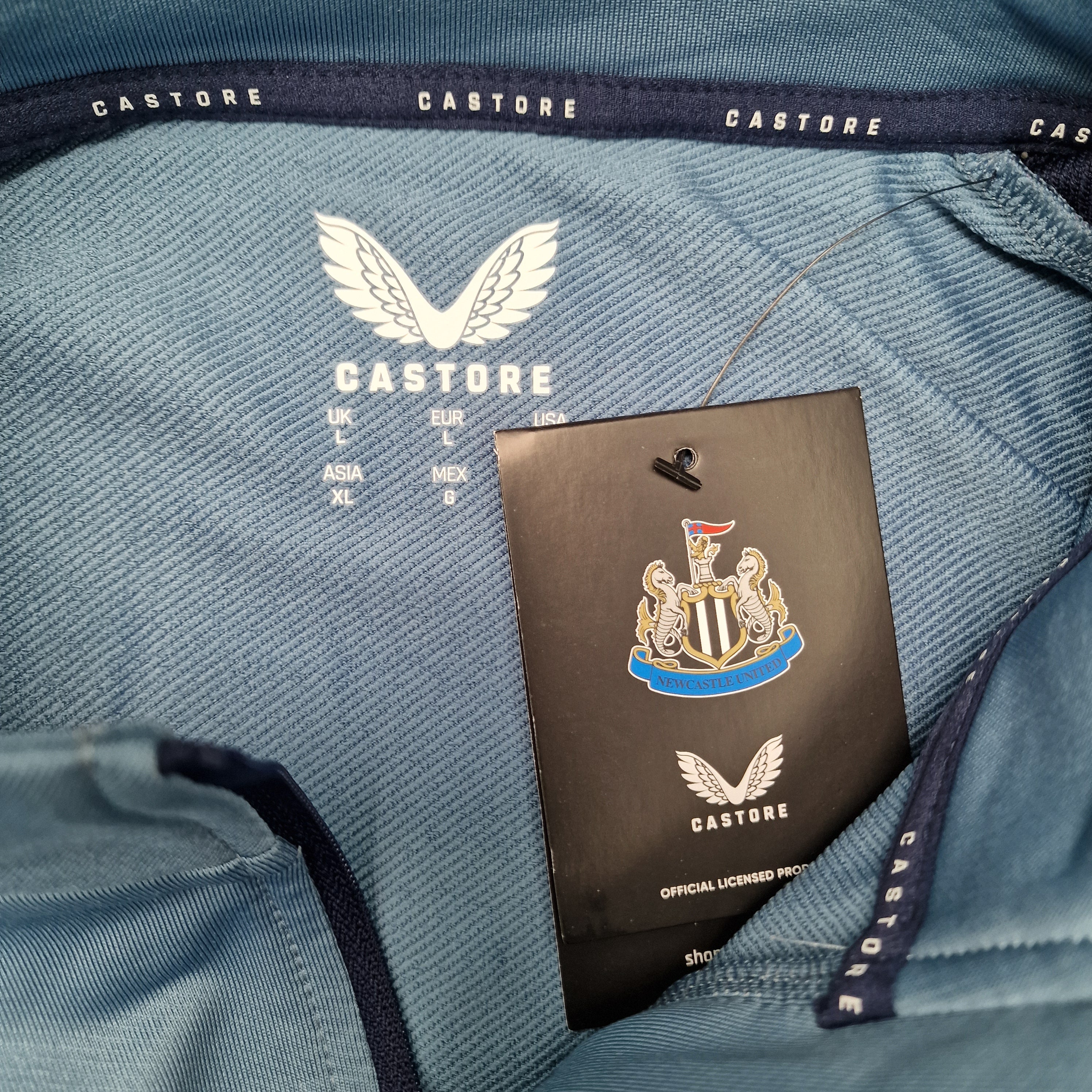 Newcastle United 2023/2024 Quarter Zip Training top (L) – Toon Kit