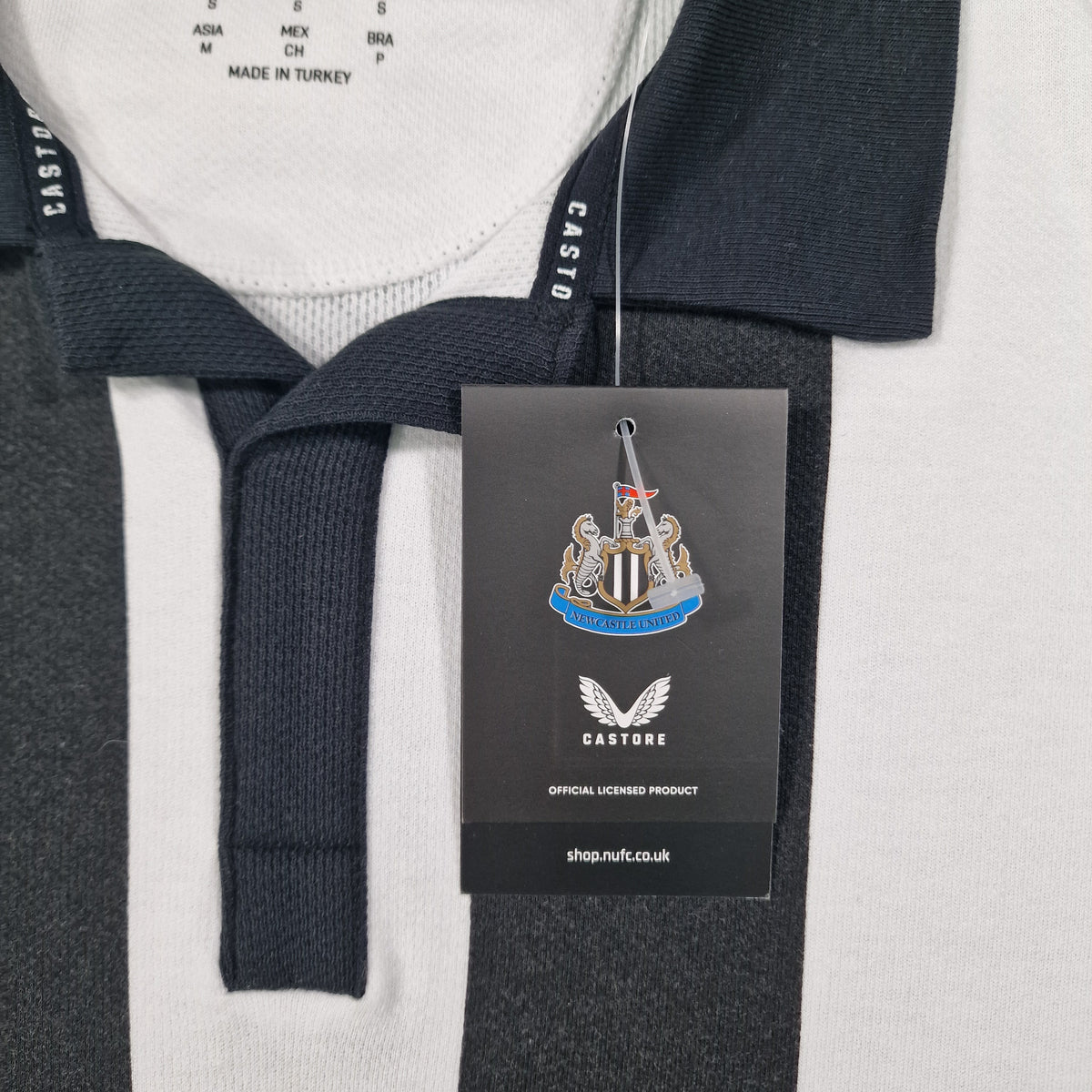 Newcastle United Castore Long Sleeved Striped Polo. 130 Years BNWT (S)